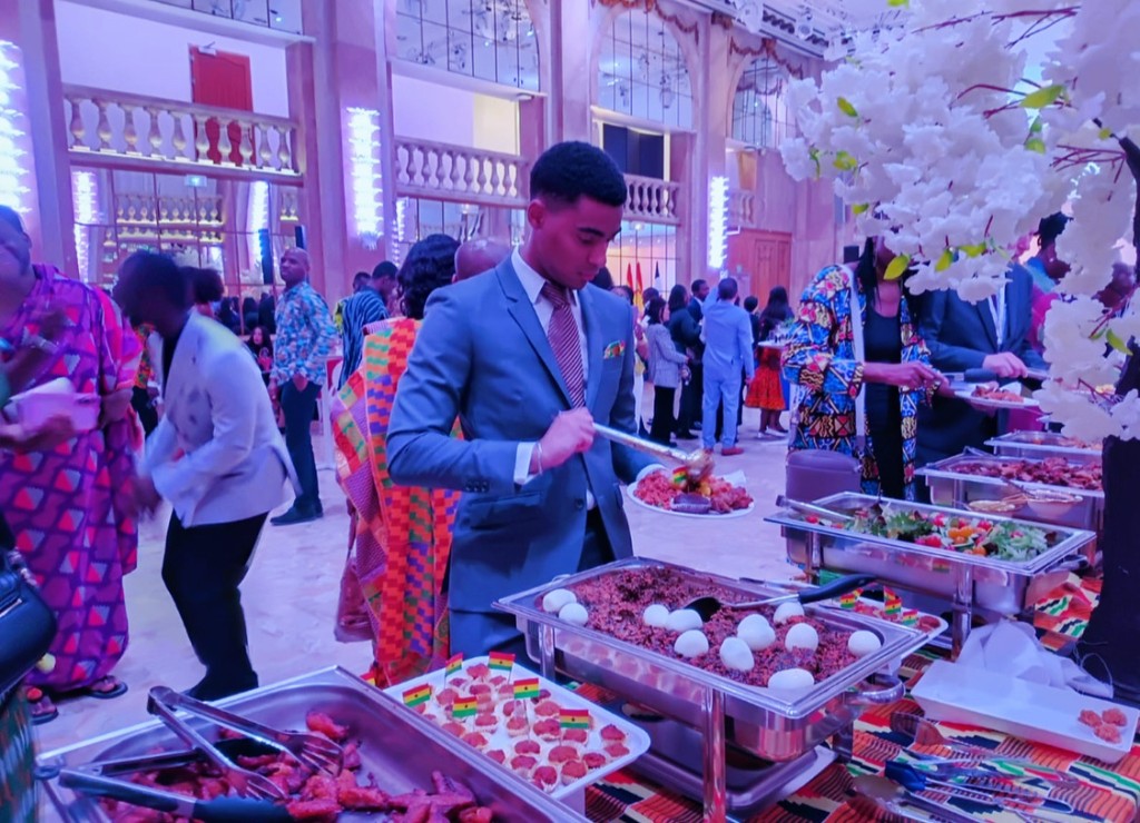 Guest serving from Black Star Bistro buffet table