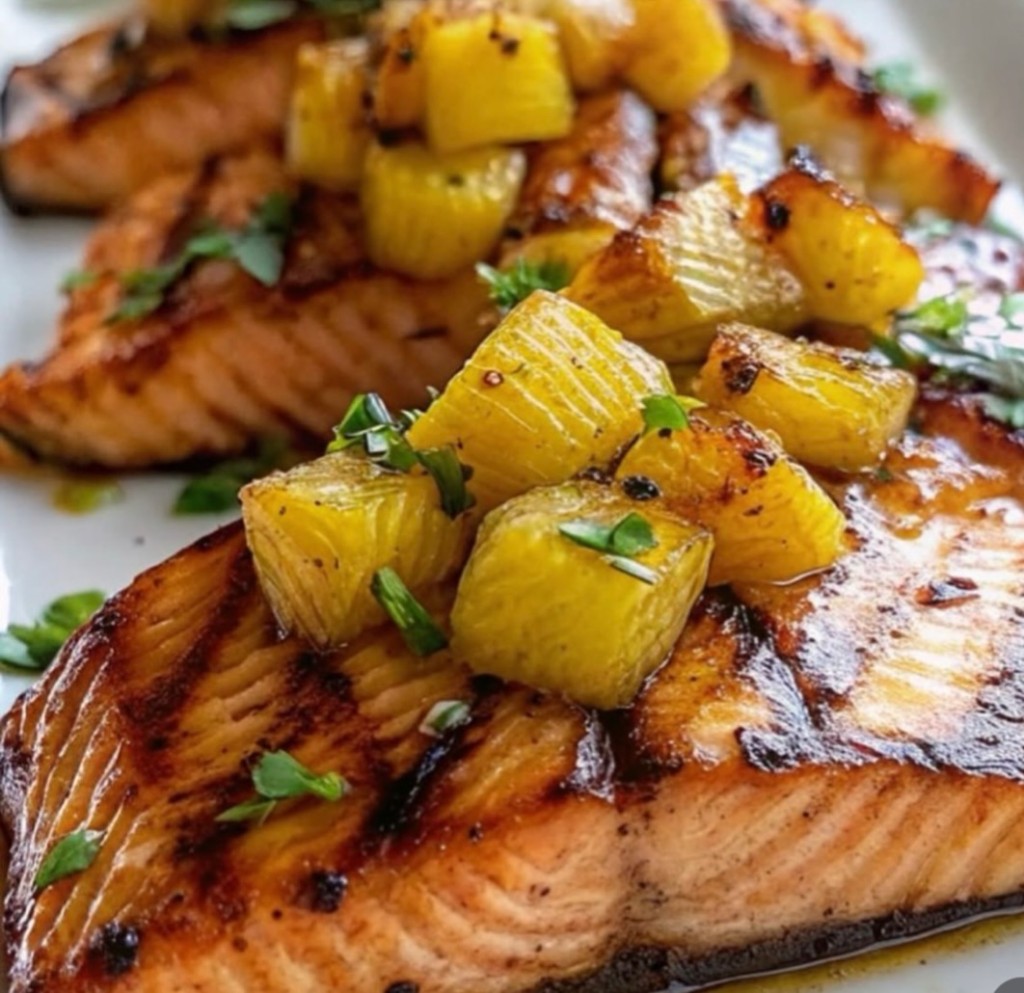 Grilled salmon with pineapple garnish