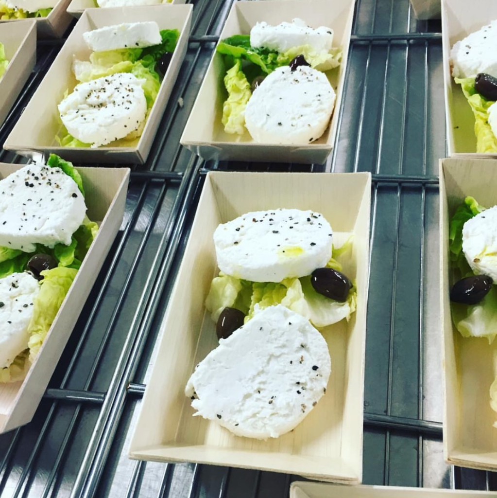 Prepared plated appetizers in catering kitchen